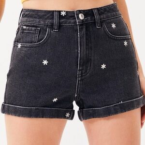 Black jean shorts with embroidered flowers